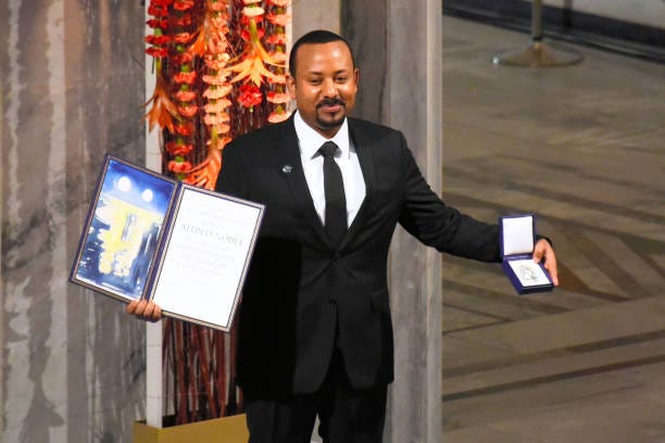 Ethiopian Prime Minister and Nobel Peace Prize Laureate Abiy Ahmed Ali poses on stage after being awarded with the Nobel Peace Prize during the Nobel...