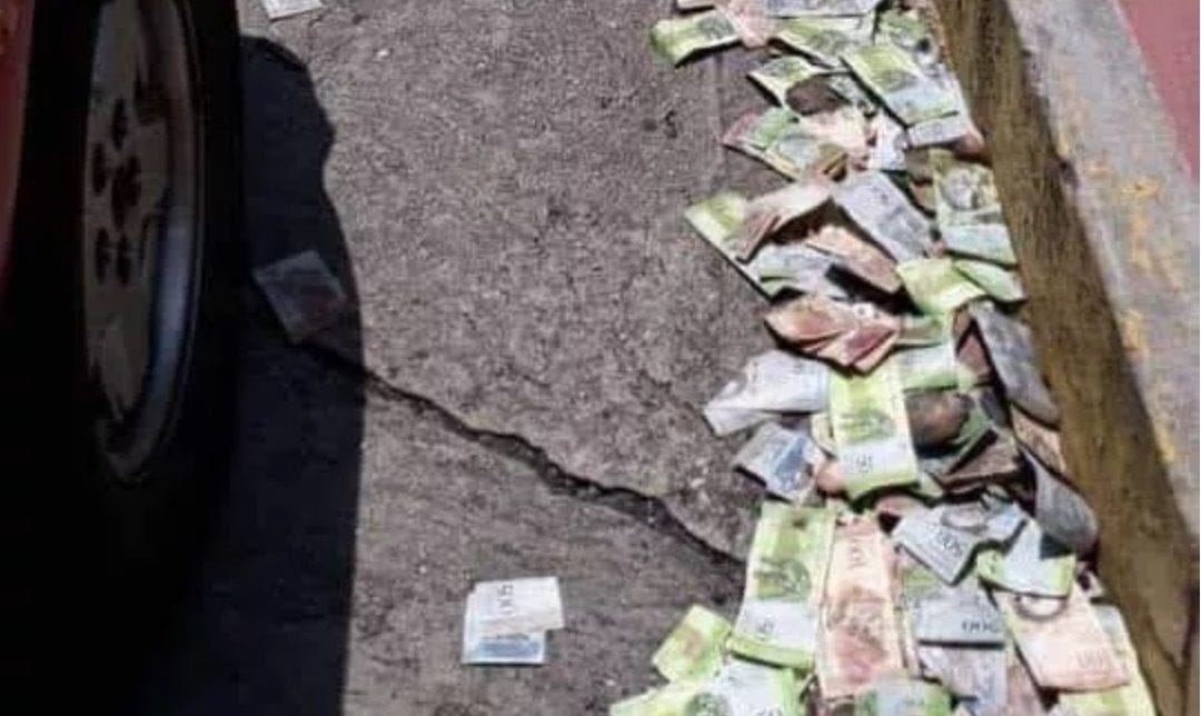Is this a Photograph of Worthless Money in the Gutters of Venezuela? |  Snopes.com