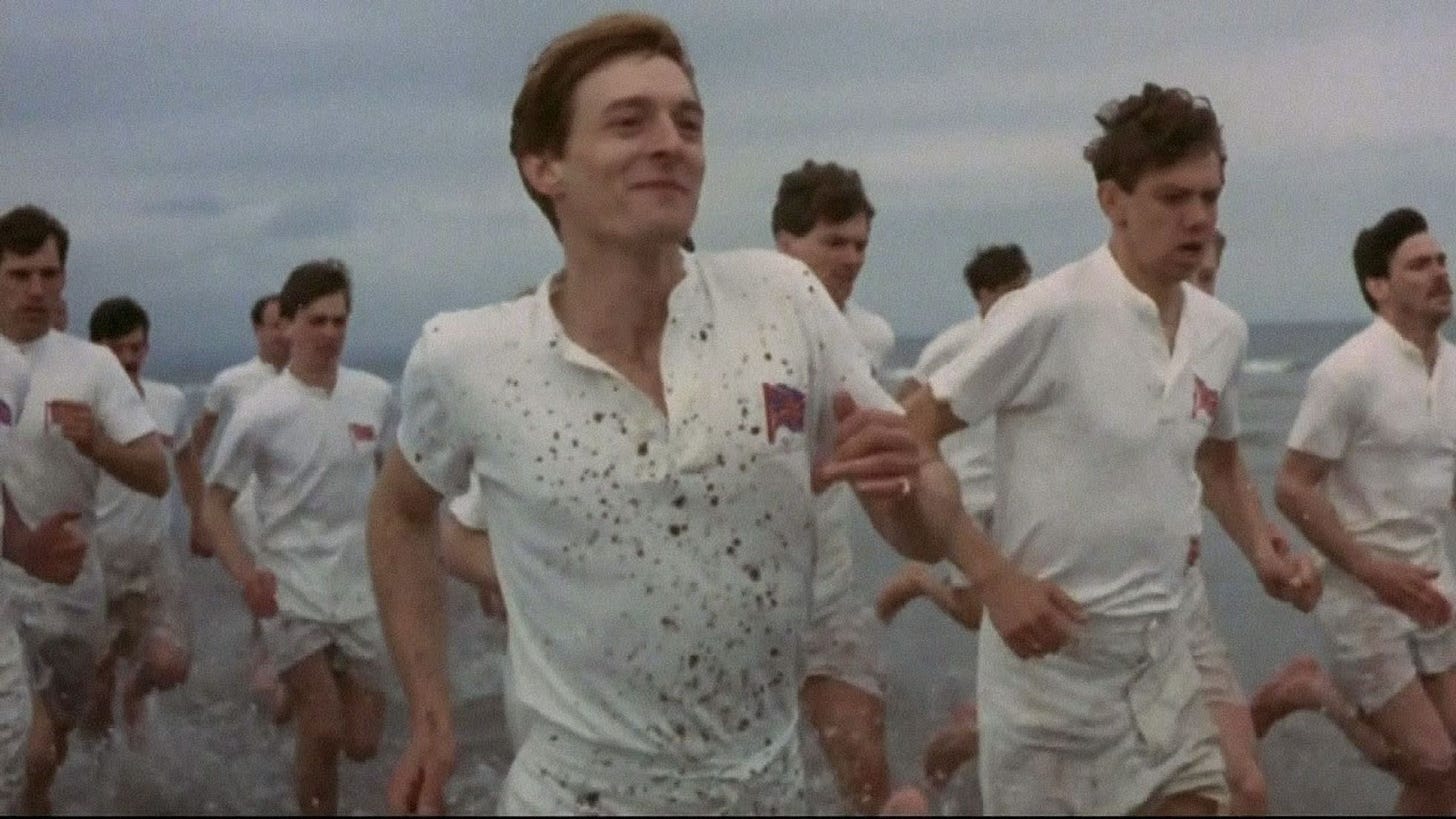 Still from Chariots of Fire of people running on the beach