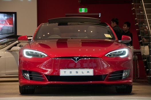 SYDNEY, AUSTRALIA - MAY 5, 2018: Tesla Model SP85 red colour par
