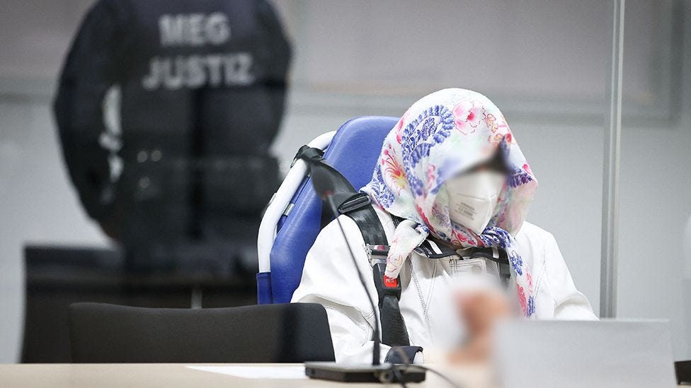 96-year-old defendant Irmgard F., a former secretary for the SS commander of the Stutthof concentration camp, sits in the courtroom at the start of her trial at the court room in Itzehoe, northern Germany, on October 19, 2021.