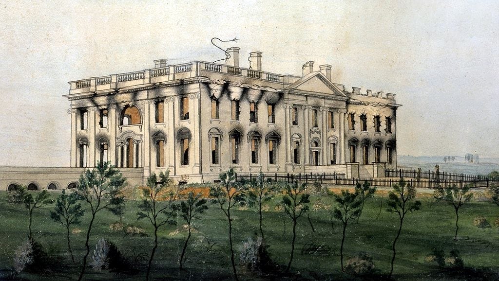 The burned-out shell of a once elegant and imposing house stands alone in the landscape. It is the White House as it looked following the conflagration of August 24, 1814, the low point of the War of 1812. 