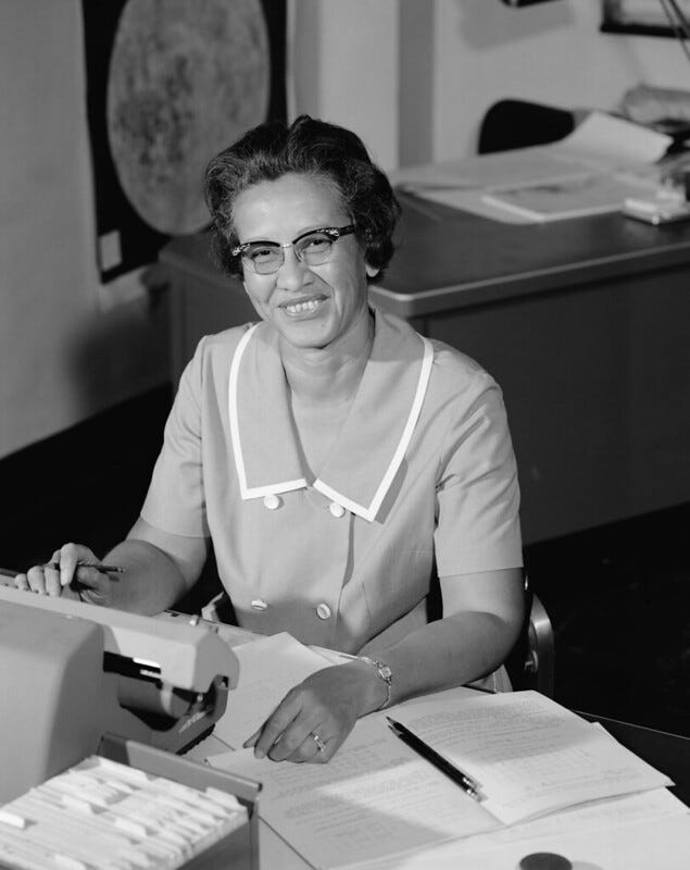 photo of Katherine Johnson in 1966 at her desk at NASA