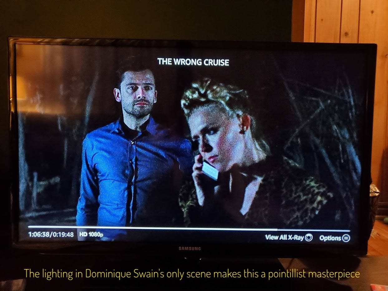 A grungily lit scene of a blonde woman talking into her phone while Dante looms behind her, captioned "The lighting in Dominique Swain's only scene makes this a pointillist masterpiece"