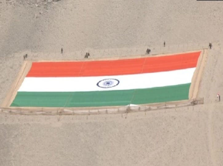 World&#39;s Largest Khadi National Flag Weighing 1000 Kg Carried By 150 Army  Troops Unveiled In Leh