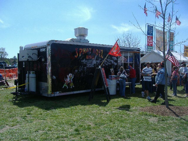 A local rib provider, their supplies were no match for the hordes of people who came. They closed up this booth before the sun went down.