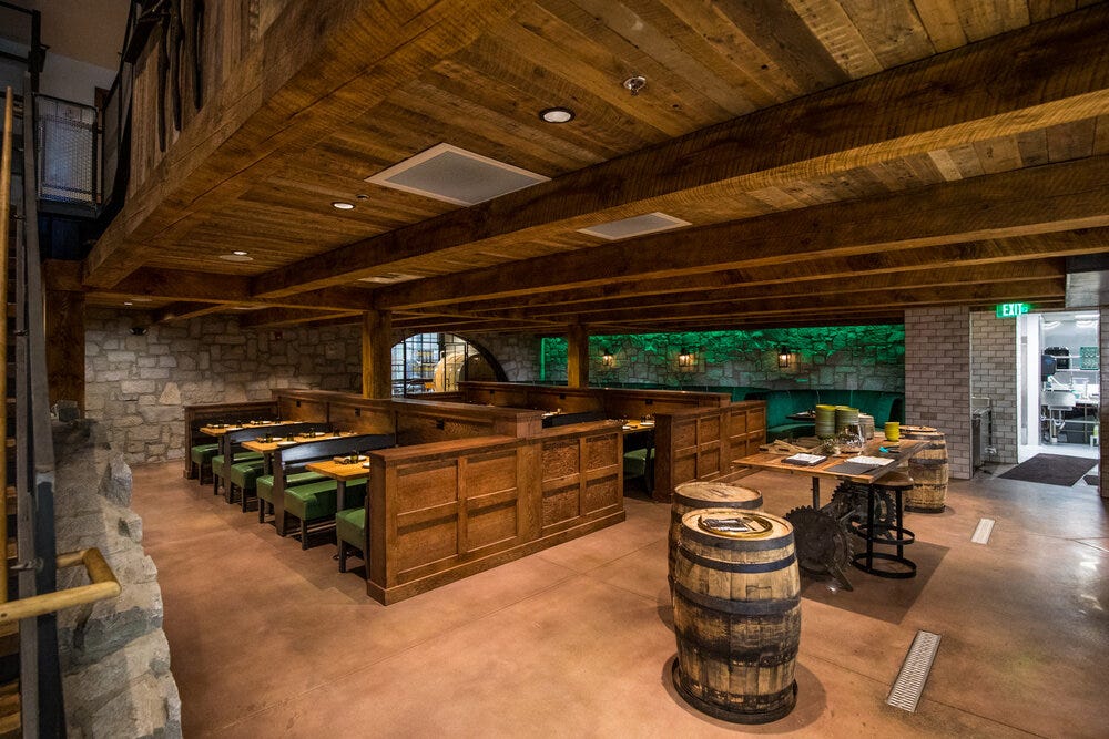 Additional dining area at Bold Monk Brewing Co. dubbed the “Beer Cellar.” The kitchen is outside of frame, to the right. The kitchen has a wood-fired grill and a custom-made Neapolitan pizza oven.