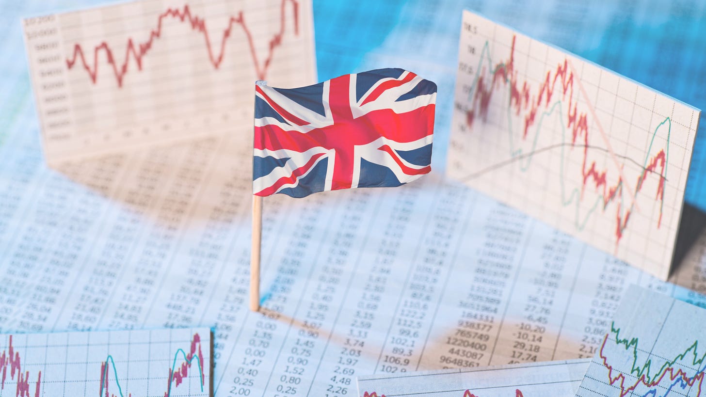 A flag of United Kingdom in the middle of papers with graphs and data