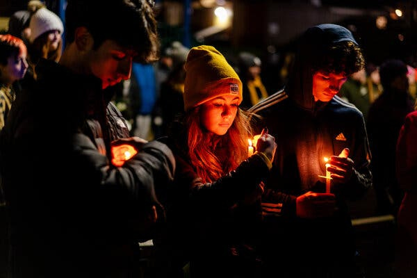Students at a vigil in memory of the victims of the Oxford High School shooting.