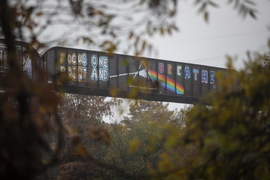 The newest painting on the bridge — a different version of "Focus One Point and Breathe" with a prism and a rainbow coming out of it.