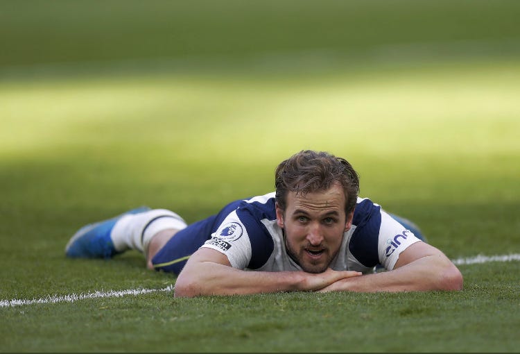 Harry Kane laying on the pitch