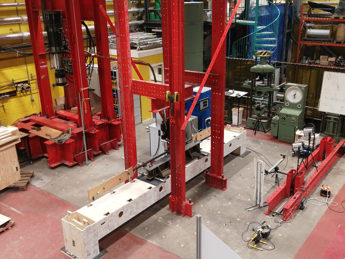 Image of machinery at the University of Edinburgh College of Engineering. A Skylark block lies below the machine as it is tested.