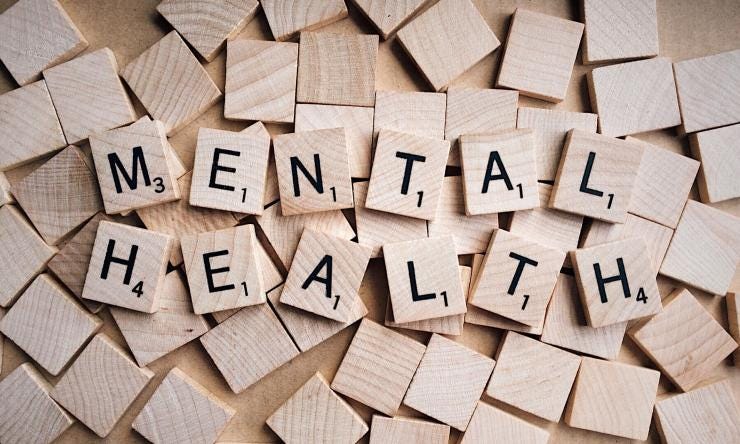 Mental Health spelled out in Scrabble tiles