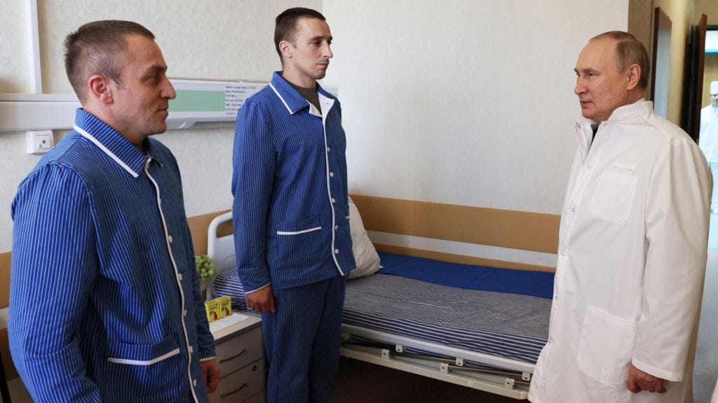 Russian President Vladimir Putin visits soldiers wounded during the conflict in Ukraine - 25 May 2022