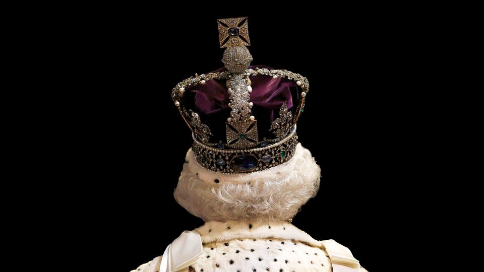 Queen Elizabeth II wearing the crown, pictured from behind