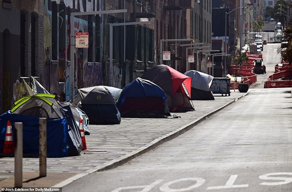 In a letter to city officials earlier this month, The Castro Merchants Association said some of the homeless people in the streets outside their stores had been harassing customers and needed help. Above, homeless tents in San Francisco earlier this summer