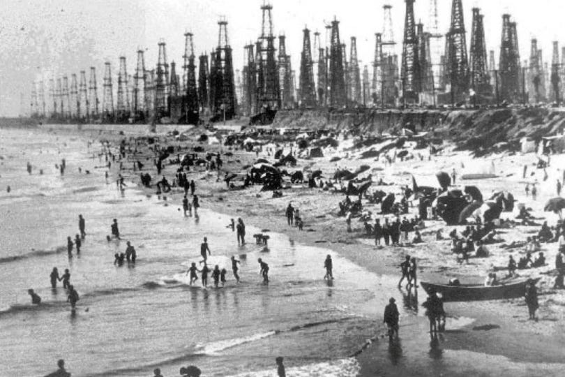 r/UrbanHell - Huntington Beach, California, during the Oil boom of 1928.