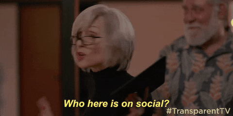 Gif of women in glasses asking who here is on social?