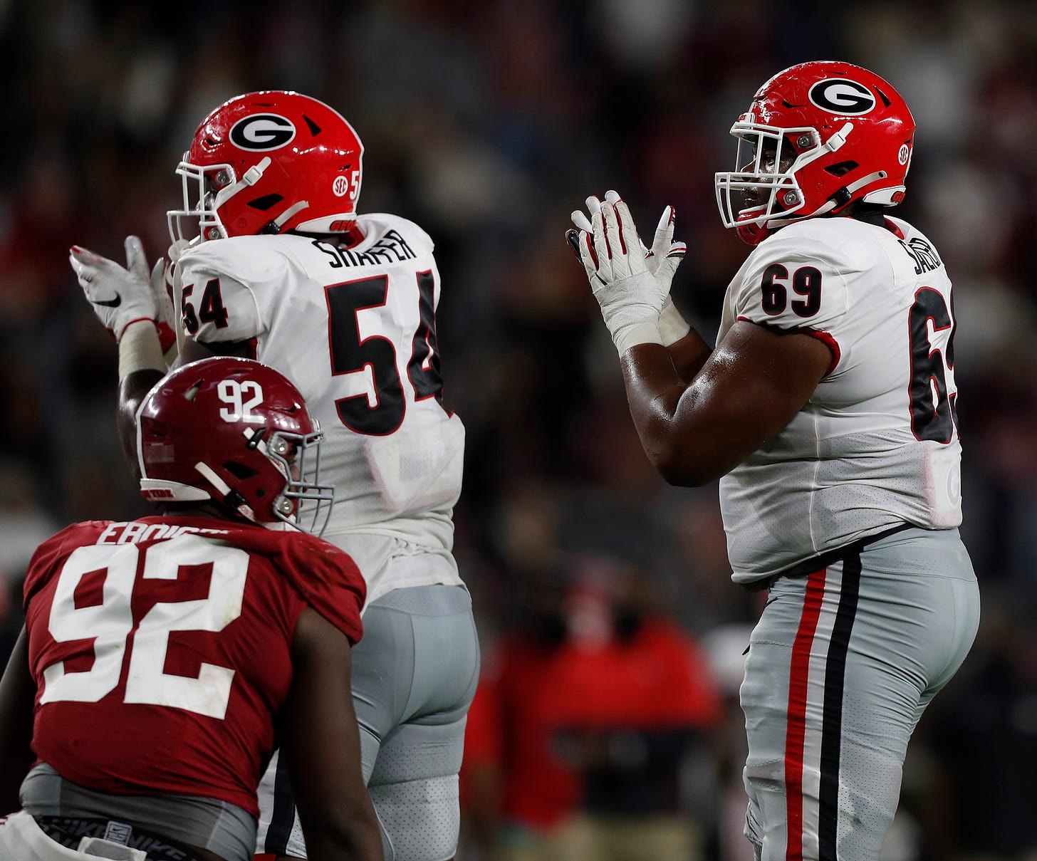Georgia offensive lineman Jamaree Salyer (69) and Georgia offensive lineman Justin Shaffer (54) during the Bulldogs' game with Alabama in Tuscaloosa, Ala., on Saturday, Oct. 17, 2020. (Photo by Skylar Lien)