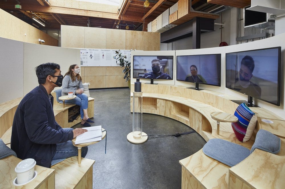 A "Campfire" space: A circular seating area with 2 people sitting in person, and 3 more on individual videoconference screens.