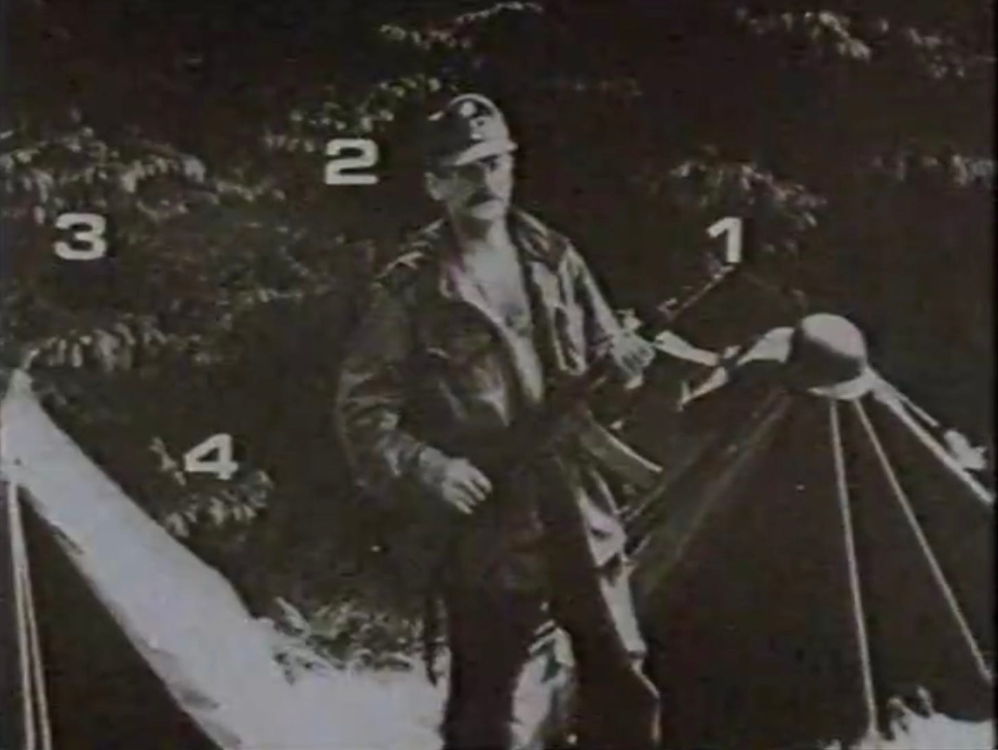 A man holding an assault rifle.