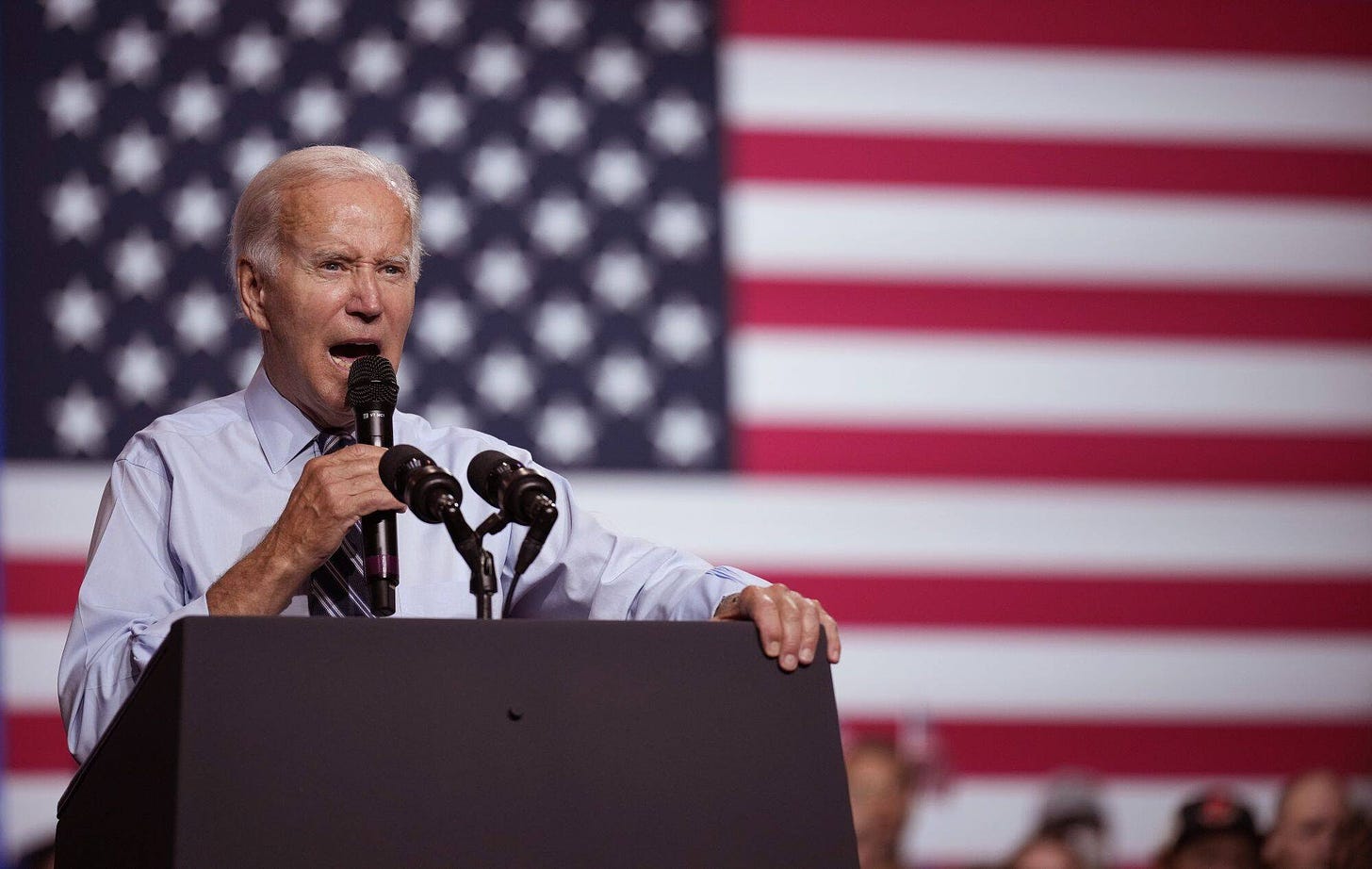 President Biden speaks during a rally hosted by the Democratic National Committee at Richard Montgomery High School on Aug. 25 in Rockville, Md. (Drew Angerer/Getty Images)