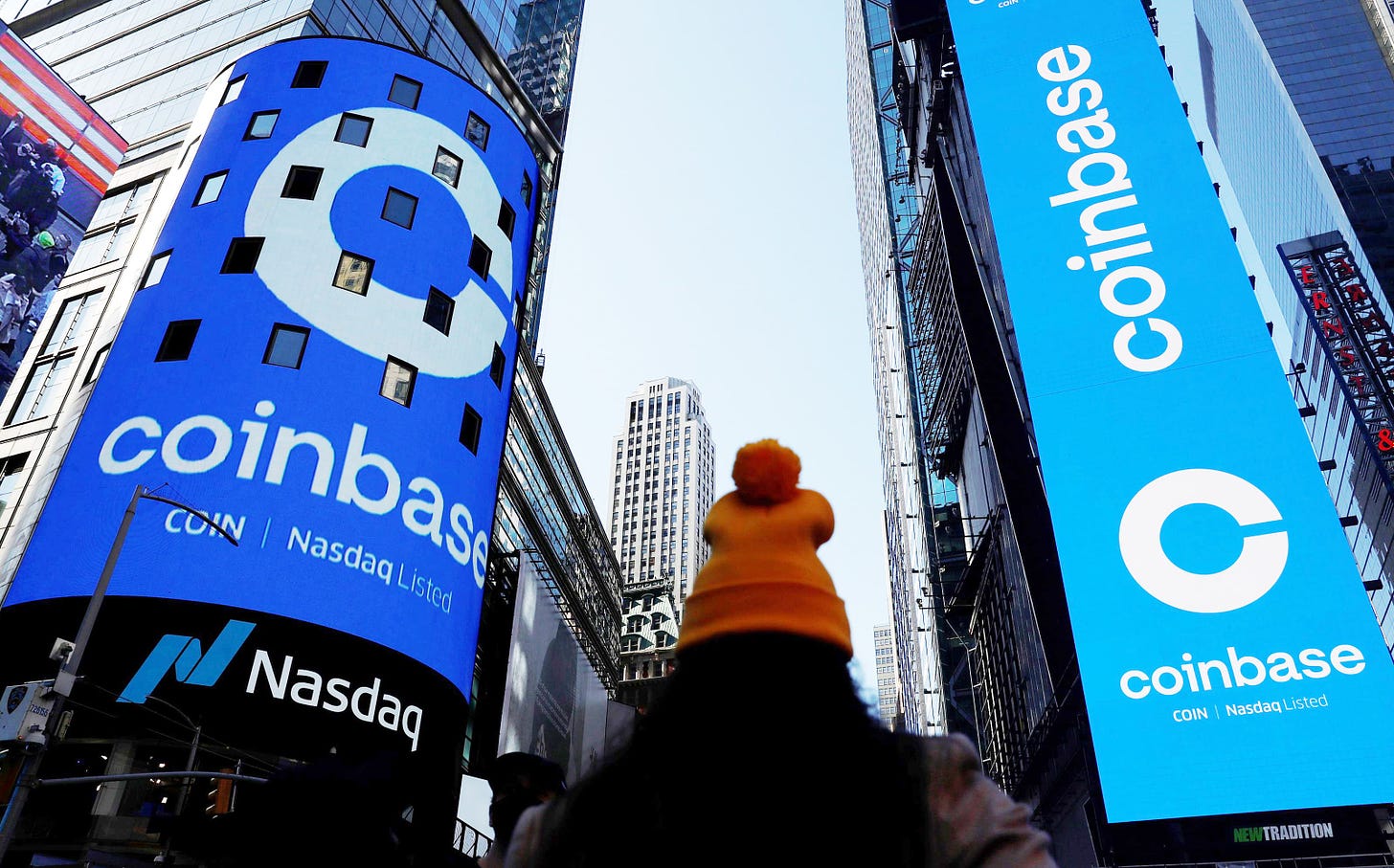 Coinbase stock debuts on Nasdaq in direct listing
