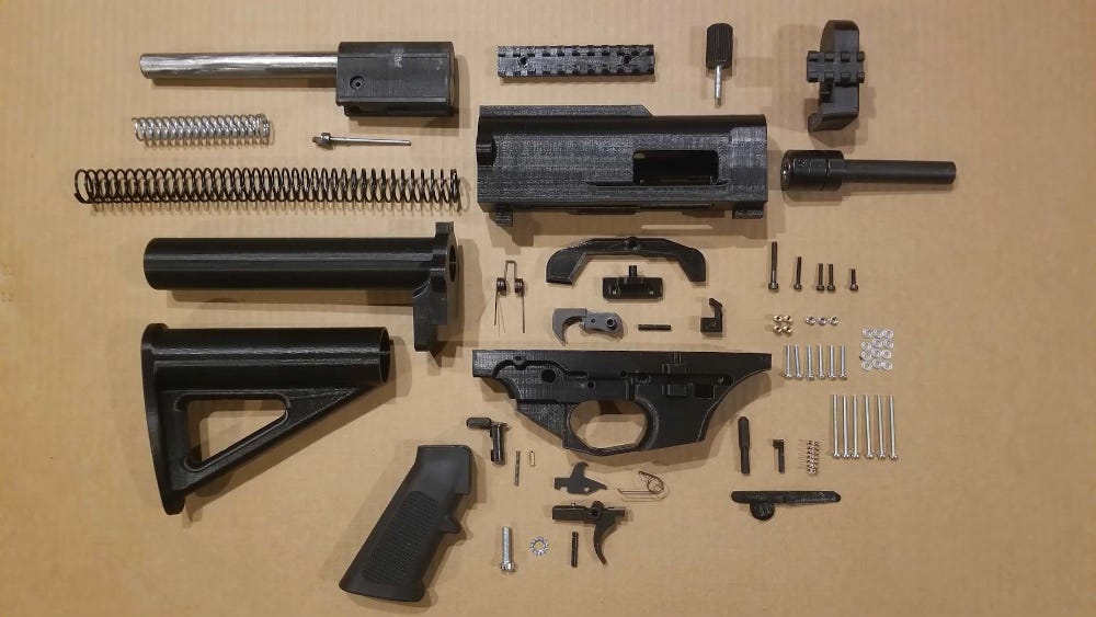 broken down parts of a 3D printed firearm