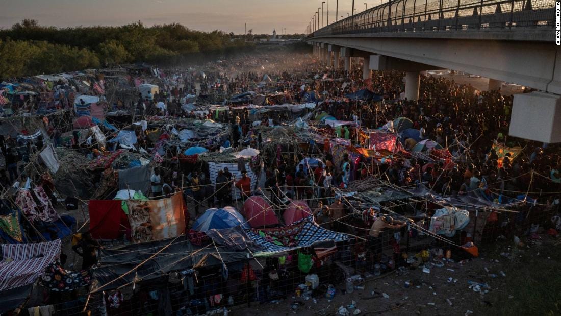 Tens of thousands of migrants held in squalor under Texas bridge - CNN