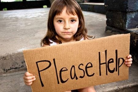 Little girl with sign that reads 'please help'