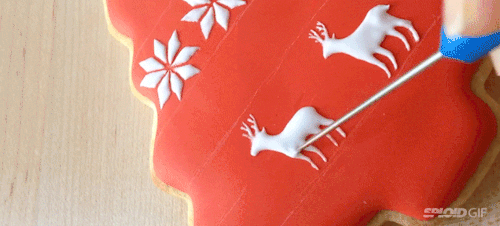 GIF of decorating Christmas cookie