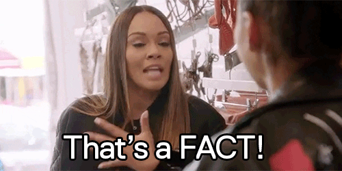 Evelyn Lozada is standing in a clothing store and saying, "That's a FACT!"