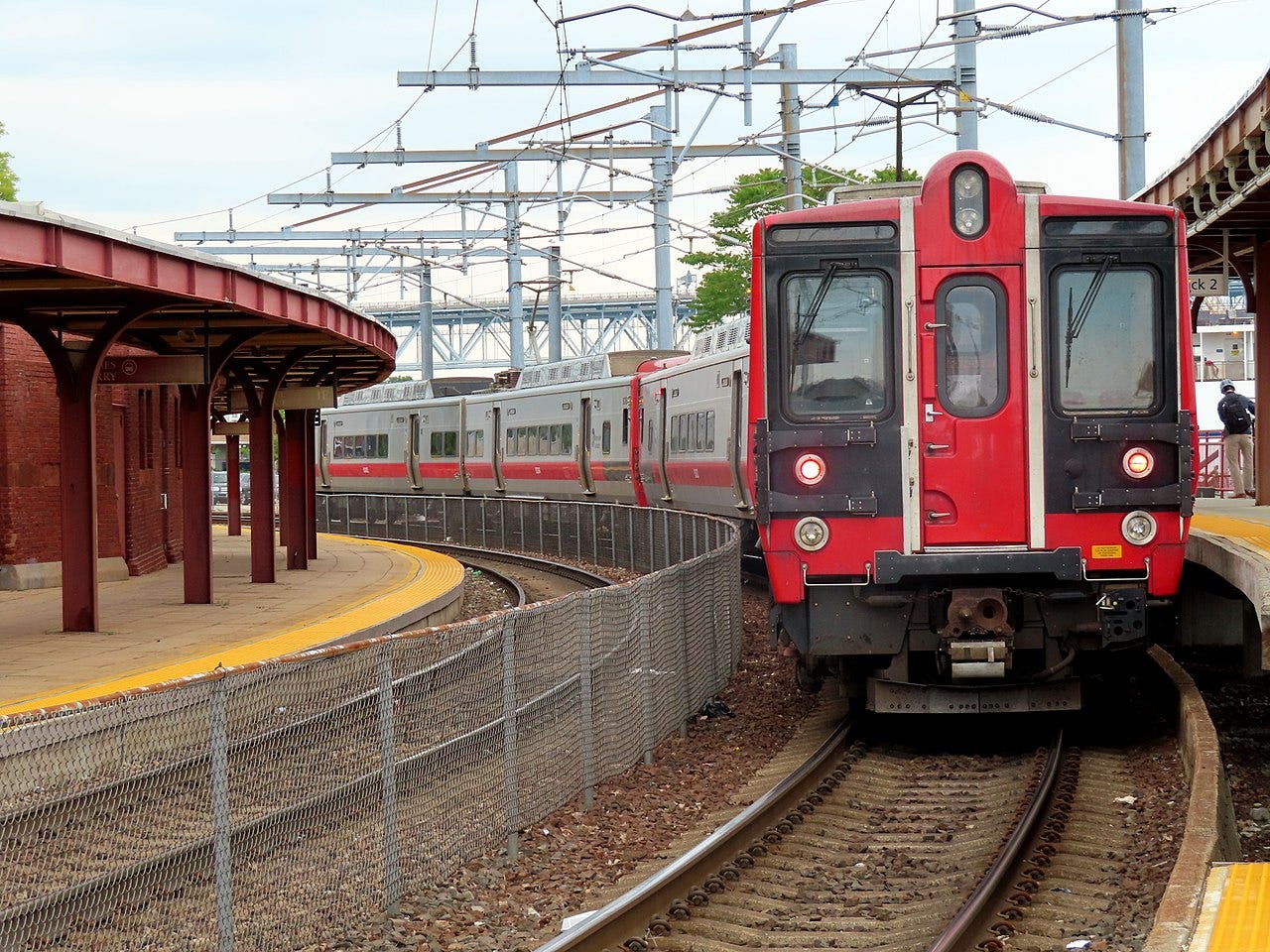 A train of electric railcars at a station