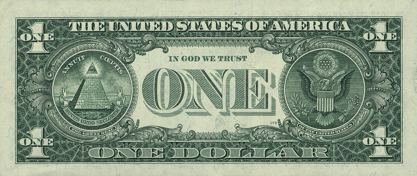 The back of a US one dollar bill showing a pyramid with the all-seeing eye on top