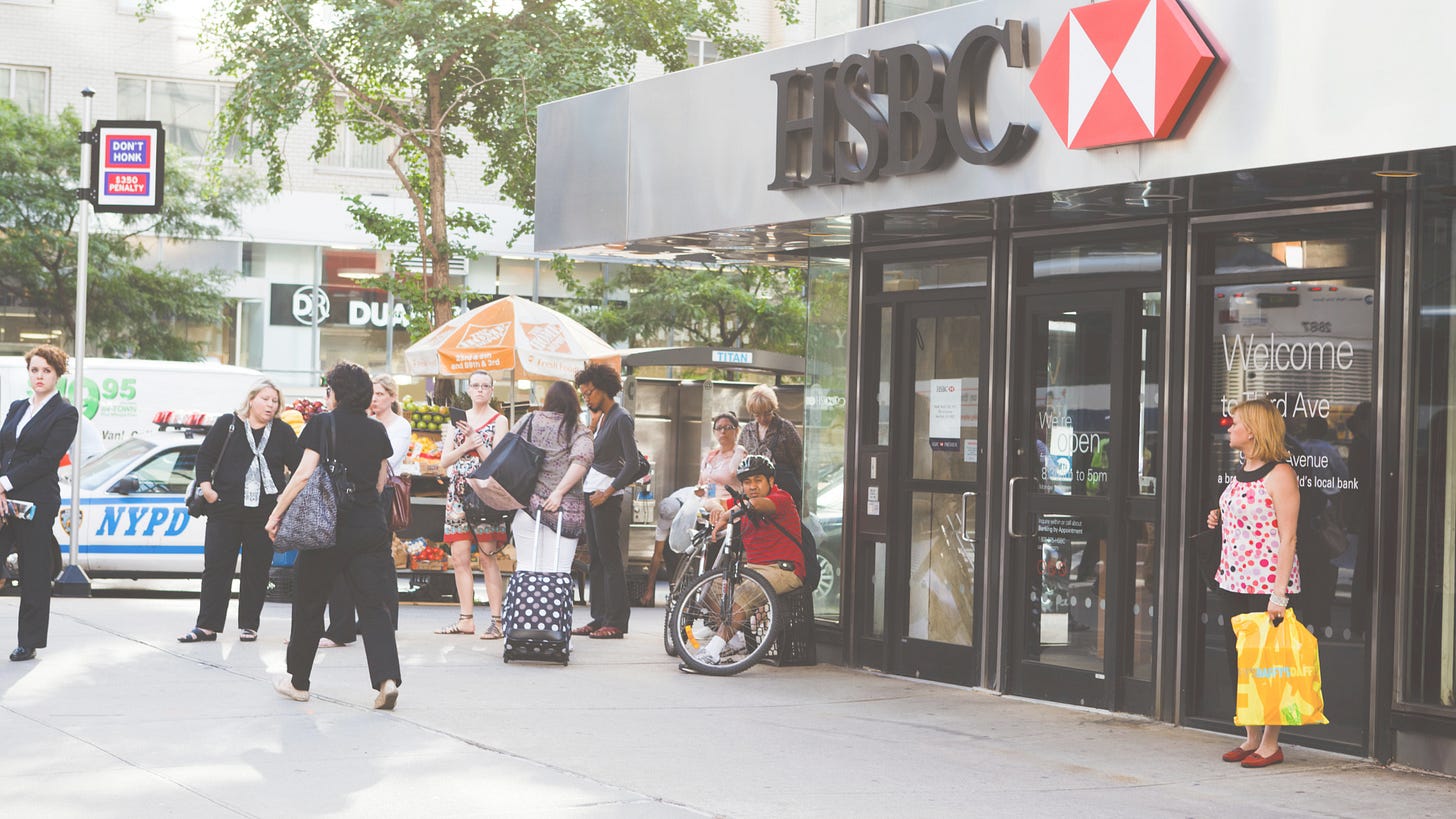 people waiting in front of HSBC office