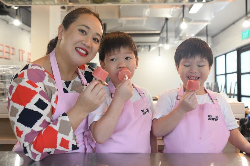 Mia Kusen with sons Matthew and Bennett
