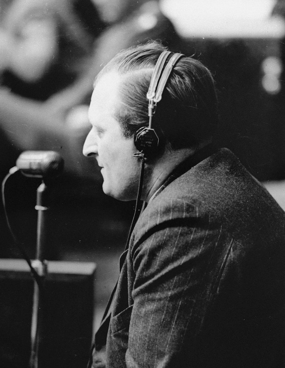 Fritz Kirchheimer, a former Buchenwald concentration camp inmate and assistant to defendant Dr. Joachim Mrugowsky, testifies as a witness for the prosecution at a session of the Medical Case (Doctors') Trial in Nuremberg.