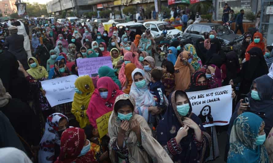 Protesters attend a demonstration on 24 December in Karachi, Pakistan, after human rights activist Karima Baloch was found dead in Canada.