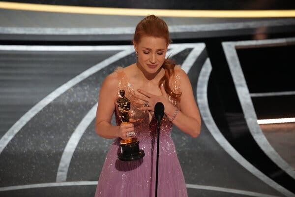 Jessica Chastain accepting the award for best actress for her performance in “The Eyes of Tammy Faye.”