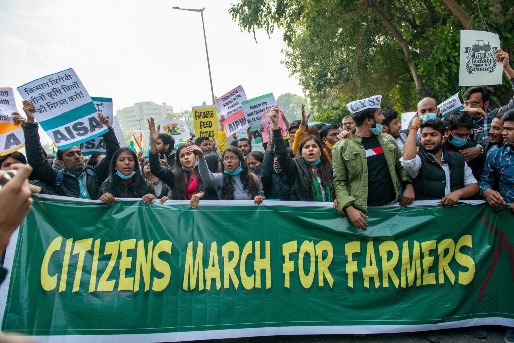 People in India protesting attacks on farmers and a partial internet ban. The protests are at the heart of a conflict between India and Twitter. (Pradeep Gaur / Getty Images)