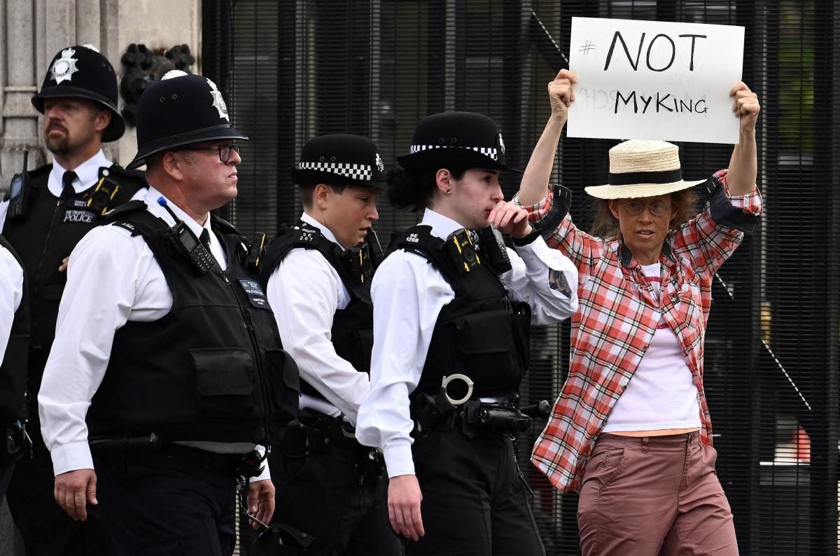 Anti-monarchy protester with 'not my King' sign led away by police in  London | The National