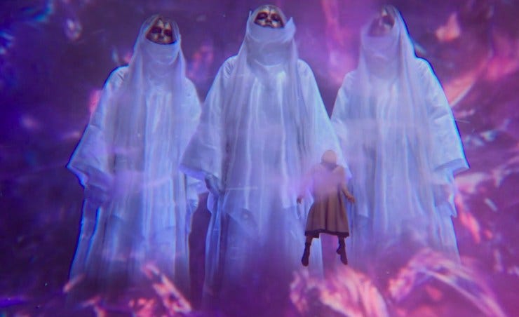 This image shows the Thirteenth Doctor (played by Jodie Whittaker) floating in front of three giant Mouri in the middle of a "timestorm" in Doctor Who: Flux's third episode, "Once, Upon Time."