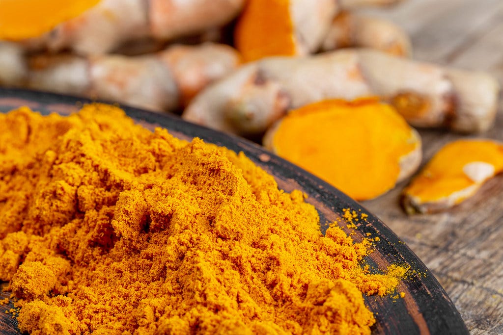 Orange turmeric powder with fresh turmeric | 💾 Marco Verch … | Flickr