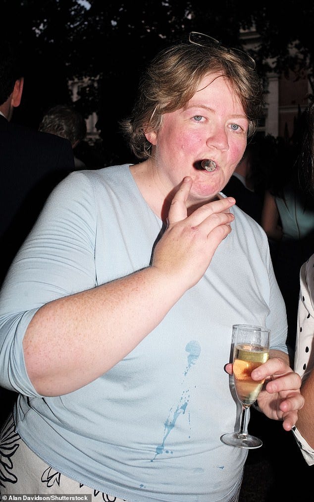 In 2015, an infamous photo snapped at a Spectator magazine party showed her puffing away on a large cigar and clutching a glass of champagne
