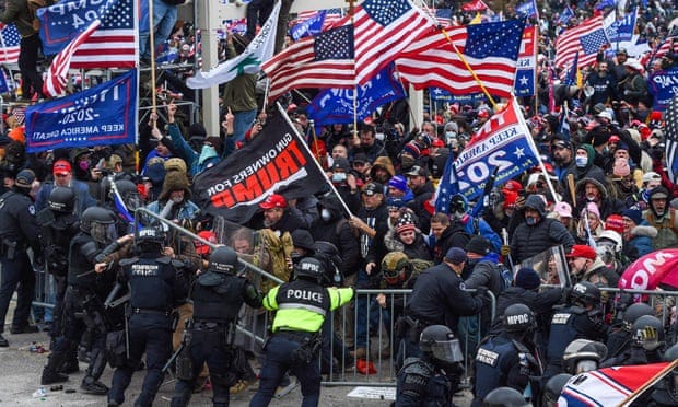 Trump supporters battle with police and security forces as they storm the US Capitol on 6 January 2021.