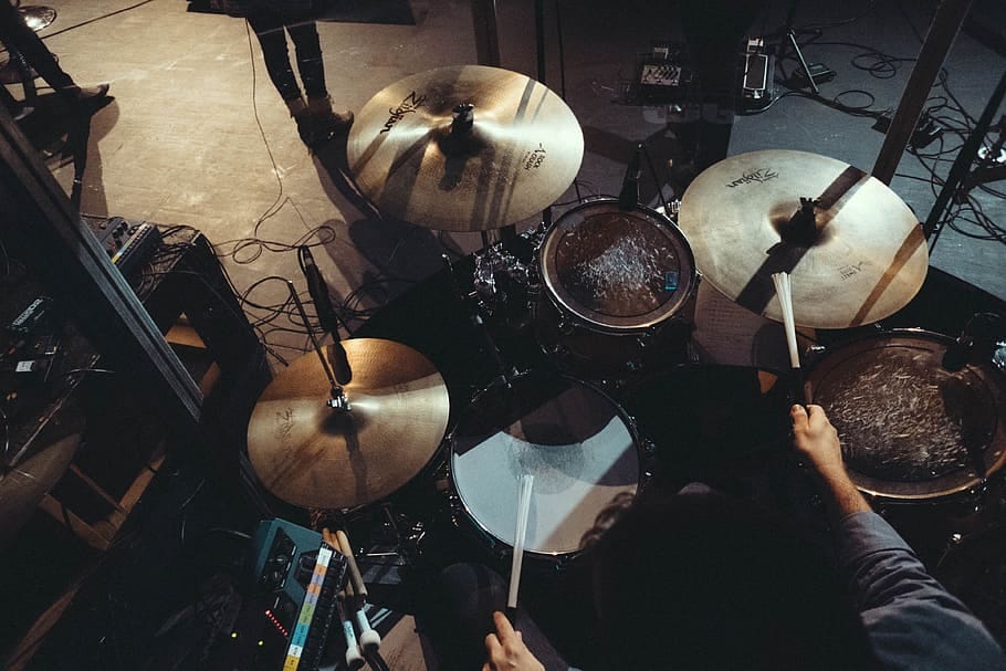 A person playing a drumset