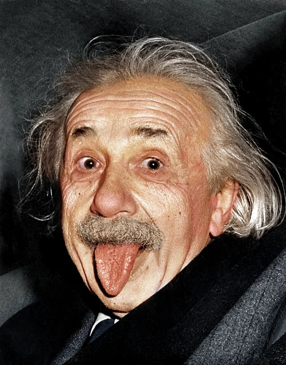 Einstein sticking his tongue out, 1951 - Rare Historical Photos