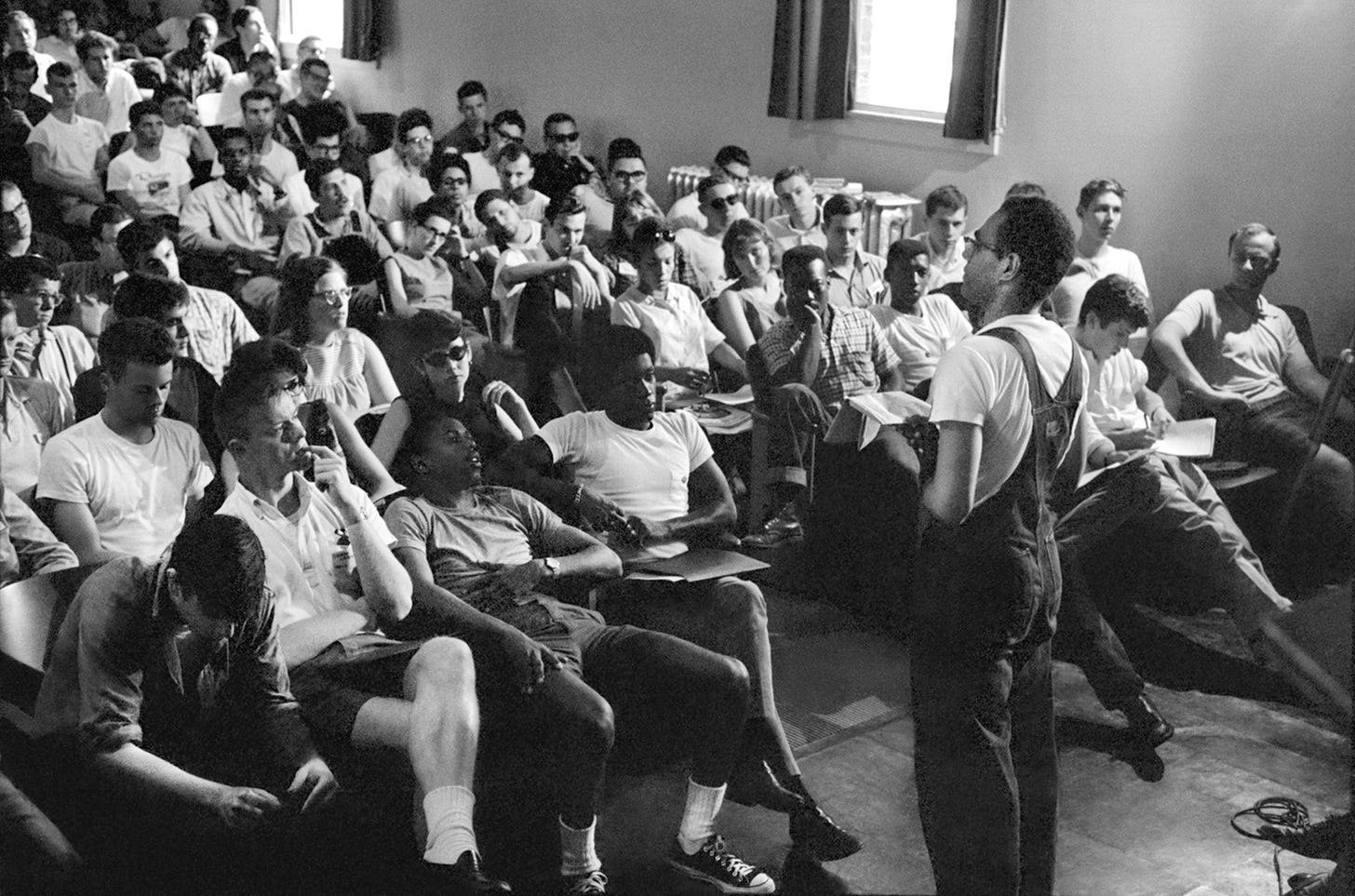 Freedom Summer organizer Bob Moses talks to volunteers at an orientation in Peabody Hall