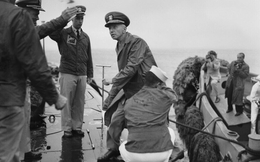 Rear Admiral Hyman Rickover, father of nuclear powered submarines, boards the USS Nautilus from the Navy Tug 534 in the Narrows below Brooklyn, New York on August 25, 1958. (AP Photo/Pool)