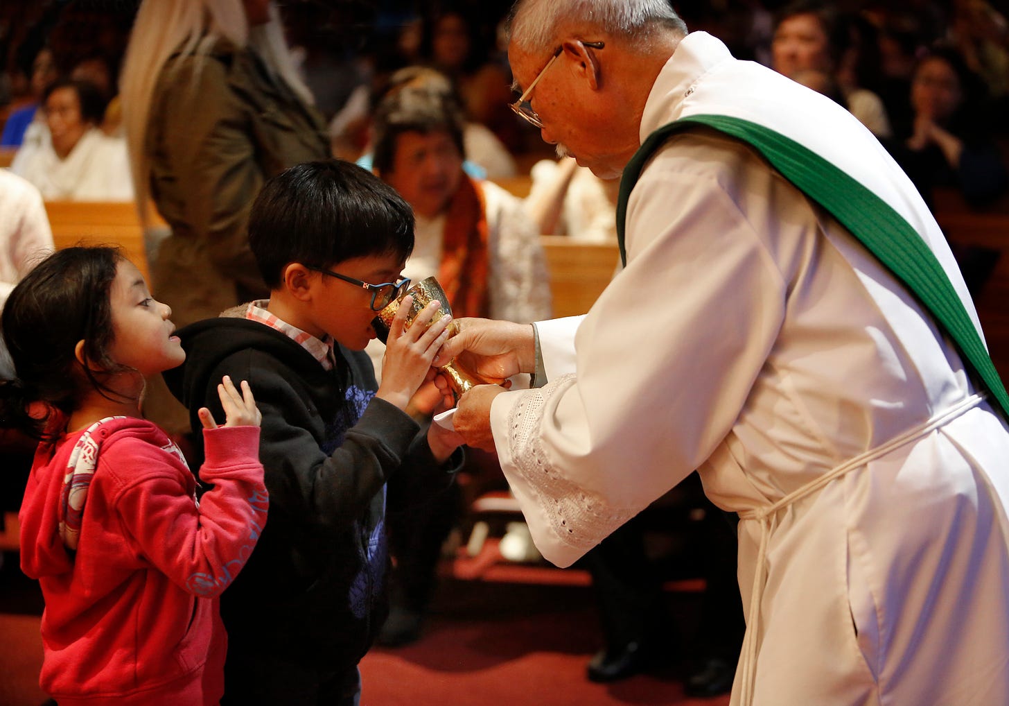 Asian Catholics gather for community Mass - Chicagoland ...